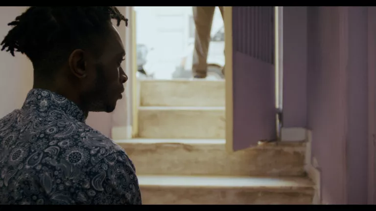 Production still from Doing his job